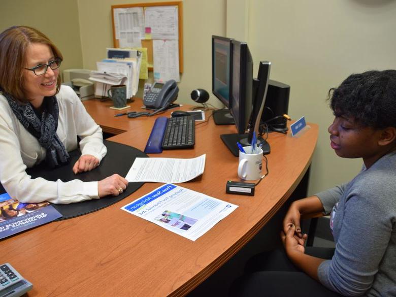 Student speaking with staff member at Penn State Abington (near Philadelphia)